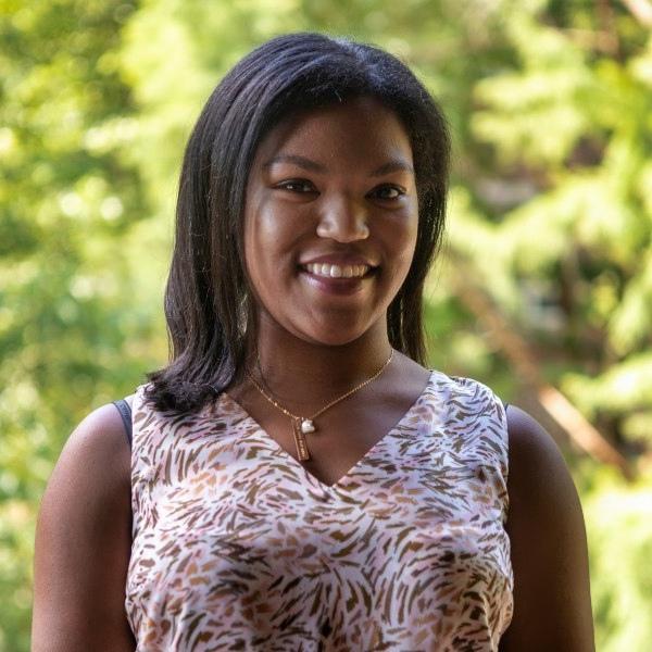 headshot of kendall riley with a natural background